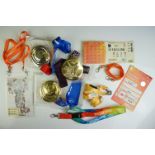 A group of Olympic Games collectables to include medals, tickets, lanyards....etc.