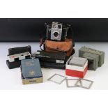 A small collection of photographic equipment to include Cameras and a slide viewer.