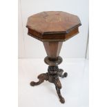 Victorian Sewing Table of trumpet form, the hinged lid opening to nine fabric covered lidded