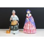 Two Royal Doulton porcelain figures to include Embroidering (HN 2855) and Victorian Lady (HN 728)