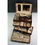 A collection of vintage and contemporary costume jewellery contained within a jewellery box to