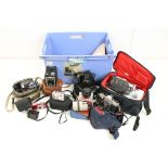A collection of cameras and photographic equipment to include a Practice MTL5B 35mm SLR, Minolta
