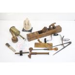 A small collection of tools to include wood planes together with a female ornamental bust and a door
