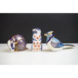 Three Royal Crown Derby paperweights, comprising: badger with silver stopper, 7.5cm high, chipmunk