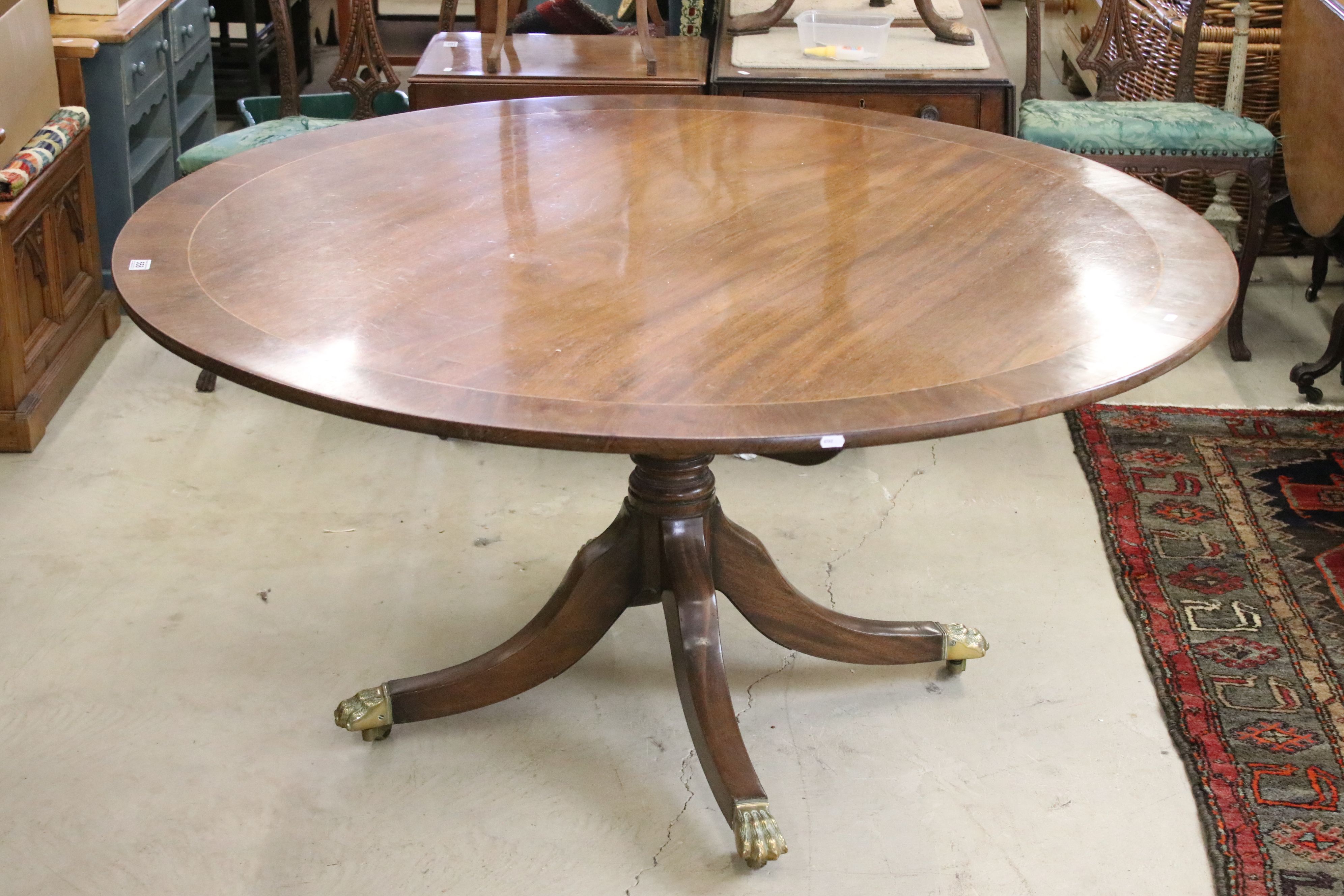 19th century style Mahogany Inlaid Circular Tilt Top Breakfast Table raised on a turned pedestal