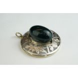 Moss agate white metal pendant, the oval moss agate bead measuring approx 3cm x 2cm, pierced