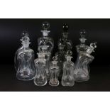 11 Scandinavian glass decanters & stoppers of varying sizes, mostly of waisted form, to include 4