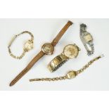 A gents 9ct gold cased Rotary wristwatch together with two ladies gold cased watches and another.