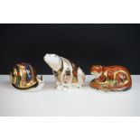 Three Royal Crown Derby paperweights, comprising: otter, gold stopper, 10.5cm long, 'Garden