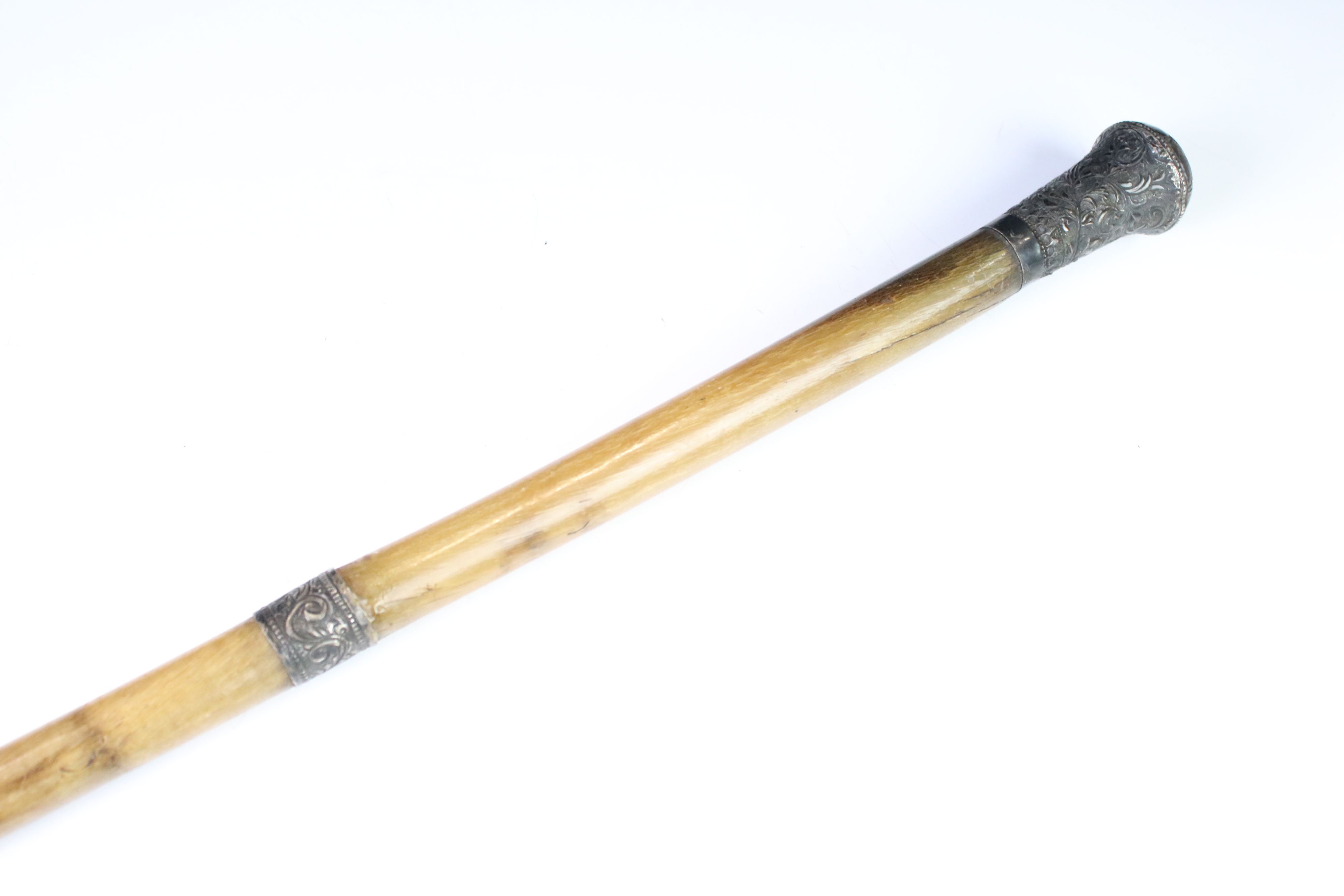 19th century rhino horn walking stick with white metal pommel, collar & ferrule, the pommel repousse - Image 5 of 6