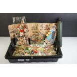 A collection of Victorian scrap book items to include figures and floral examples.