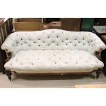 Victorian Walnut Framed Chesterfield Settee with pale blue button upholstery, shaped back, scrolling