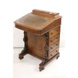 Victorian Rosewood Davenport, the top with hinged lid opening to a fitted stationery rack, the