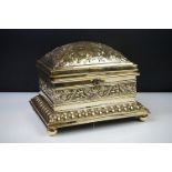 Victorian brass jewellery casket, with repousse scrolling foliate & floral decoration, lined