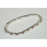 Silver opal and ruby line bracelet