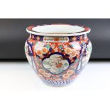 Japanese Porcelain Fish Bowl or Planter decorated in the Imari palette with panels of exotic