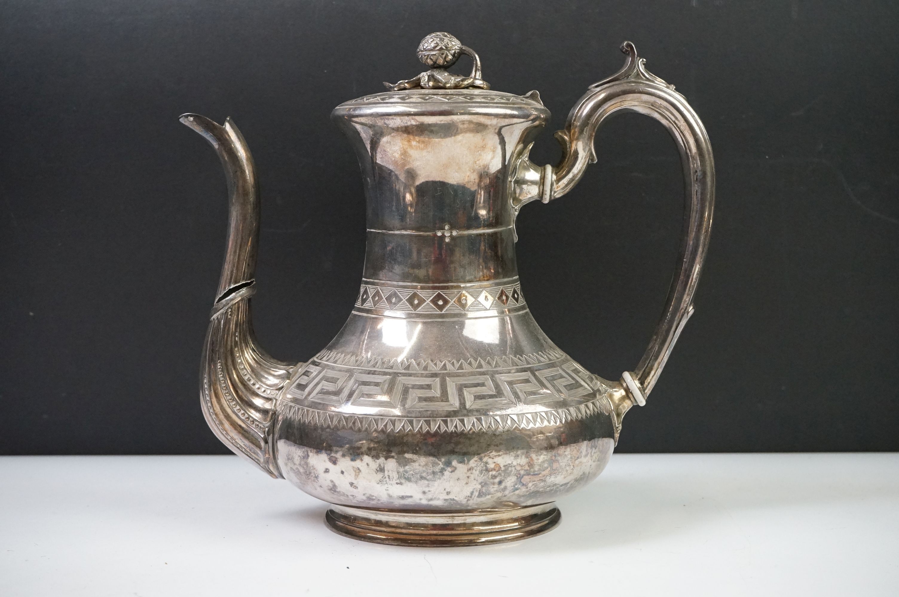 An antique silver plated tea set to include teapot, cream jug, sugar bowl and water jug decorated - Image 6 of 22