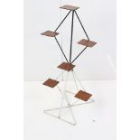 Mid century iron workshop display stand with six mahogany shelves, 81.5cm high