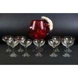 Collection of Nine Original Babycham Glasses together with Beswick Siamese Cat hanging on a Red