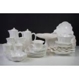 Collection of Shelley & Foley blanc de chine tea ware and ceramics, with moulded petal and leaf