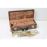 A Yamaha YTR-232 brass trumpet complete with mouthpiece and protective case.
