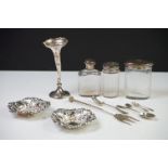 A collection of fully hallmarked sterling silver collectables to include a pair of pin dishes, bud