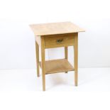 Pale Oak Square Side Table with single drawer and shelf below, raised on square tapering legs,