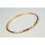 A ladies 9ct gold metal core bangle, maker marked H.G. & S.