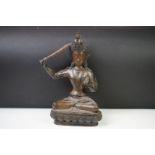 Tibetan Buddhist bronze Tara, Manjushri, depicted seated upon a lotus and holding sword, 32cm high