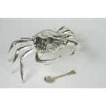 Unusual silver plated table salt in the form of a crab with a silver spoon