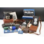 A collection of vintage photographic equipment to include a Rolleicord twin lens reflex medium