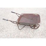 Vintage iron wheelbarrow