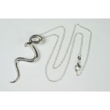 Silver snake pendant necklace on silver chain