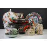 Collection of Oriental ceramics & figures to include a Famille Rose teacup & saucer on celadon style