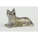 Silver cast figure of a dog