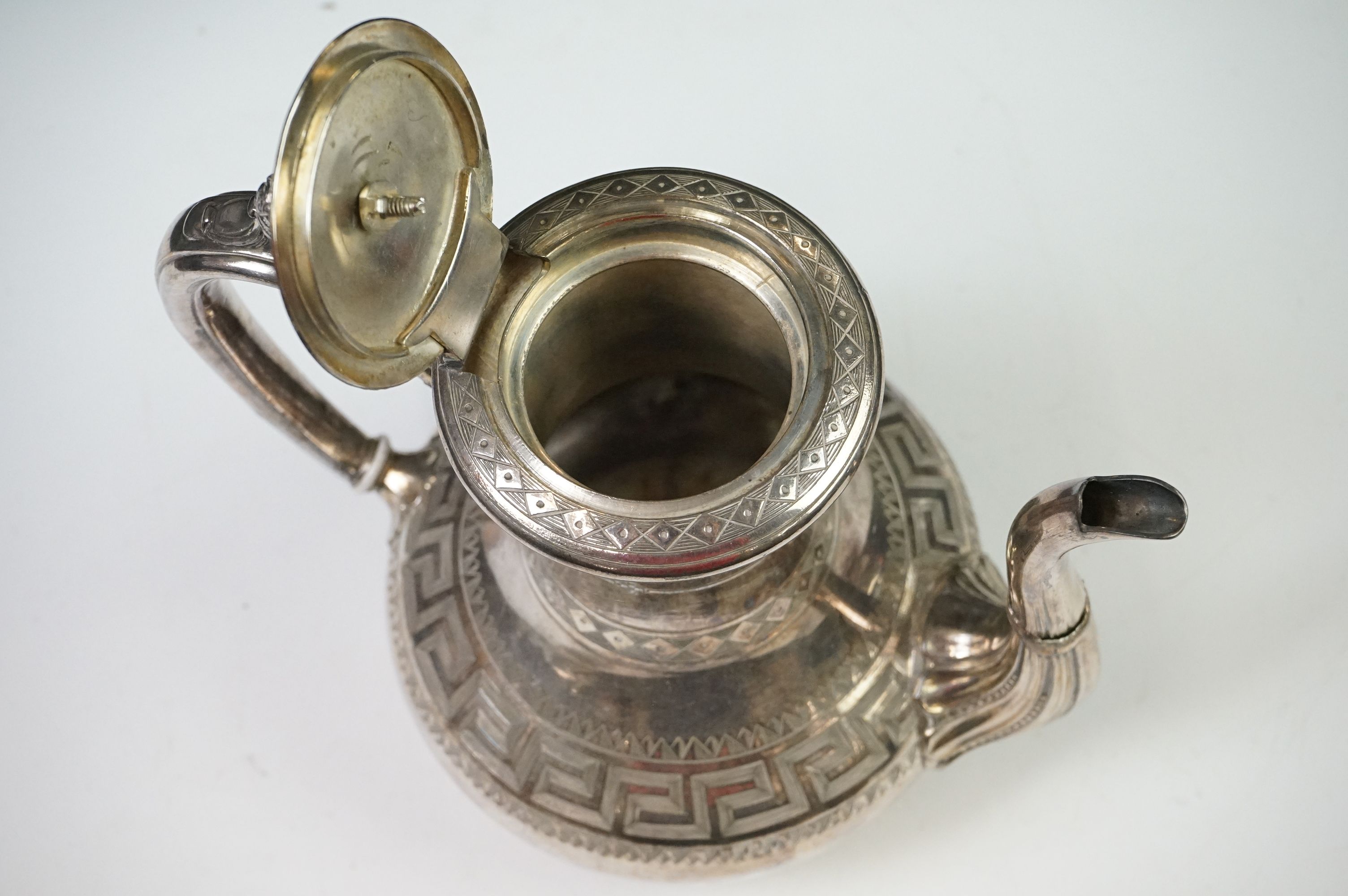 An antique silver plated tea set to include teapot, cream jug, sugar bowl and water jug decorated - Image 8 of 22