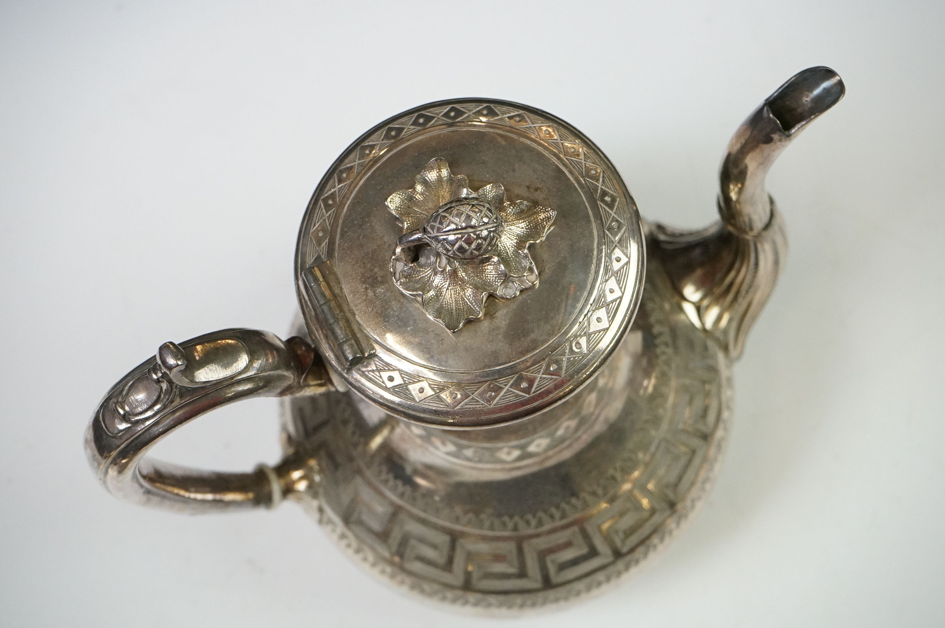 An antique silver plated tea set to include teapot, cream jug, sugar bowl and water jug decorated - Image 7 of 22