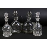 Pair of cut glass claret jugs & stoppers of flattened form with star-cut decoration (26.5cm high),