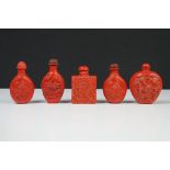 A collection of five Chinese cinnabar lacquer scent bottles.
