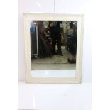Large framed and painted bevel edged wall mirror, approx. 137cm x 113cm