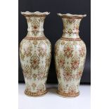 Pair of 20th century Chinese Ceramic Baluster Vases, decorated with a pattern of flowers on a