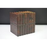 Huntley & Palmers novelty biscuit tin modelled as a row of books. Measures 16cm W x 16cm H x 12cm D