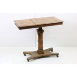 Victorian Oak Reading or Artists Table with two easel back hinged lid to top, raised in an