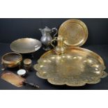 A collection of mixed metal ware to include brass trays, brass bowl, asian coffee pot, pewter