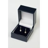 Pair of 14ct white gold diamond drop earrings