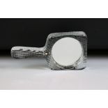 Pukeberg of Sweden textured glass hand mirror (with makers label). Measures approx 18cm long