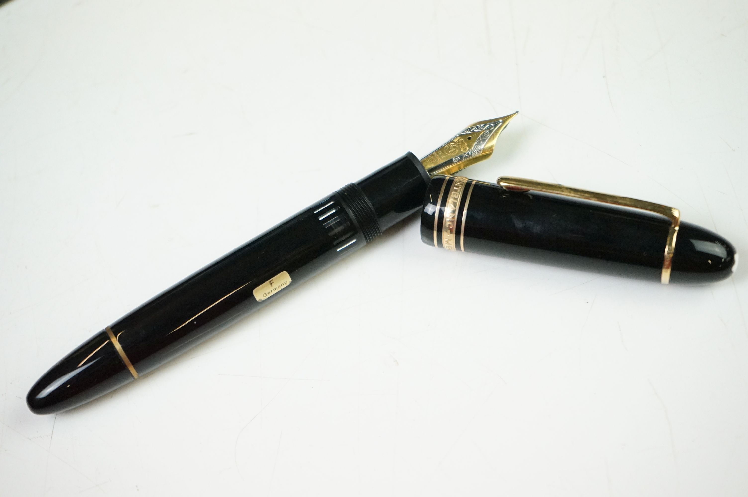 A boxed Mont Blanc 149 fountain pen with 18ct gold nib complete with ink bottle and related book and - Image 2 of 4