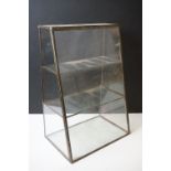 Leaded glass plant display cabinet, of sloping form, with two glazed shelves. Measures approx 30cm W