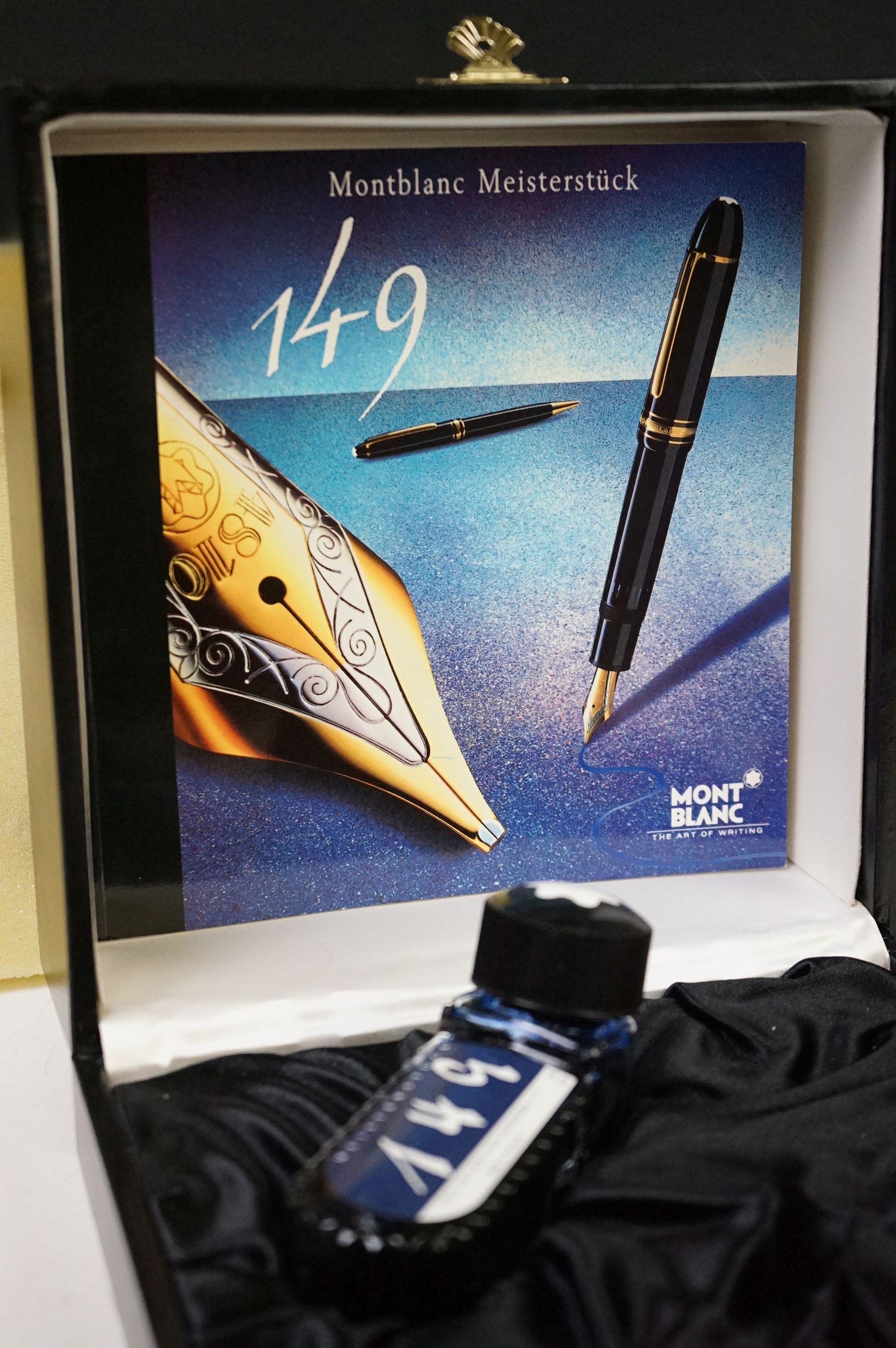A boxed Mont Blanc 149 fountain pen with 18ct gold nib complete with ink bottle and related book and - Image 3 of 4
