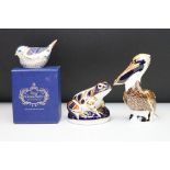 Three Royal Crown Derby paperweights, comprising: 'Brown Pelican' with gold stopper, 13cm high, frog